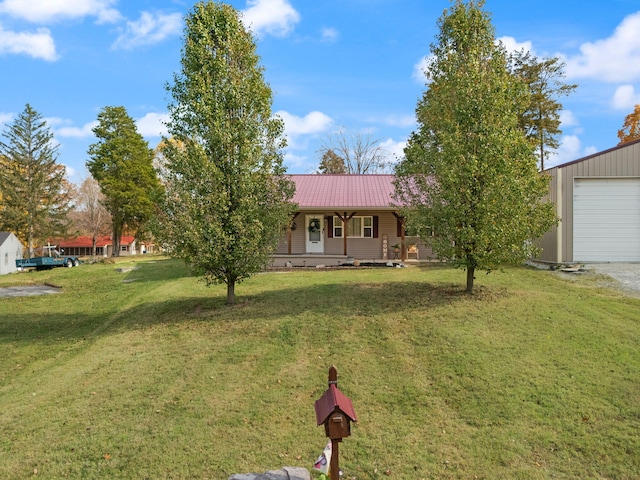 single story home with a front yard, a porch, and a garage