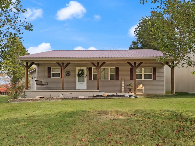 ranch-style home with a porch and a front lawn