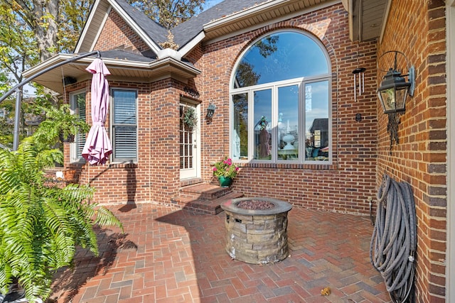 entrance to property with a patio area