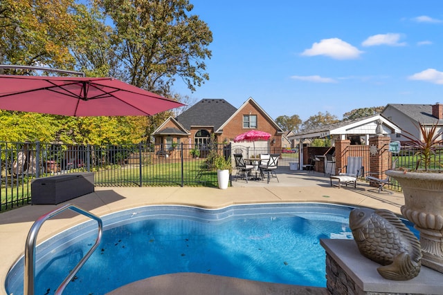 view of pool featuring a patio and a gazebo