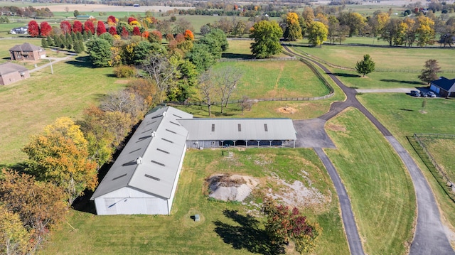 birds eye view of property featuring a rural view