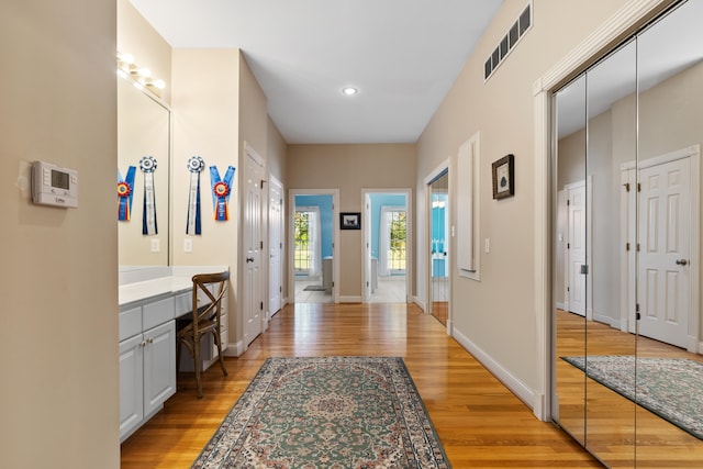 hallway featuring light hardwood / wood-style floors