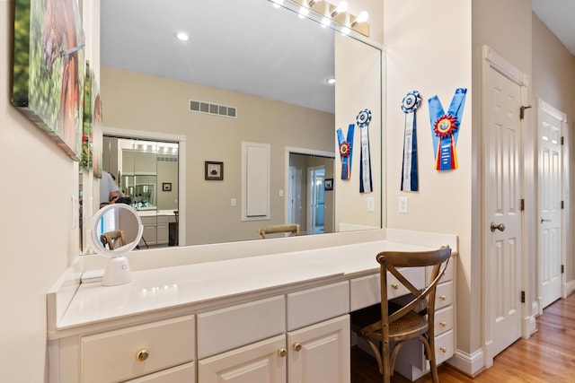 bathroom featuring hardwood / wood-style floors