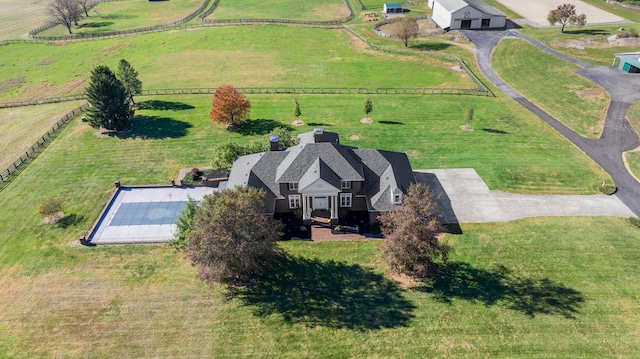 birds eye view of property featuring a rural view