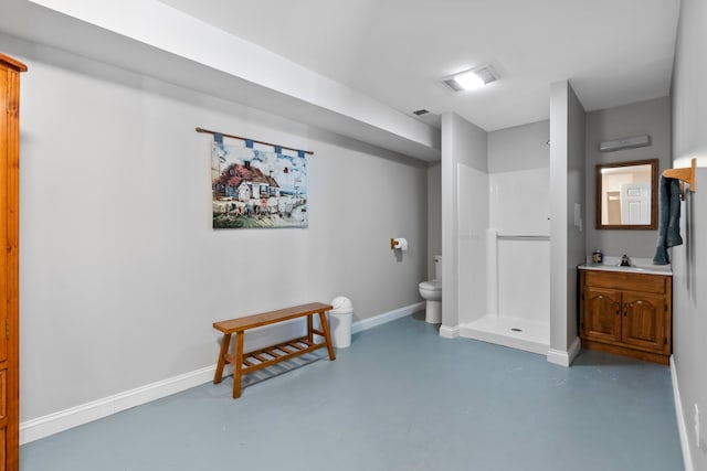 bathroom with toilet, concrete floors, vanity, and a shower