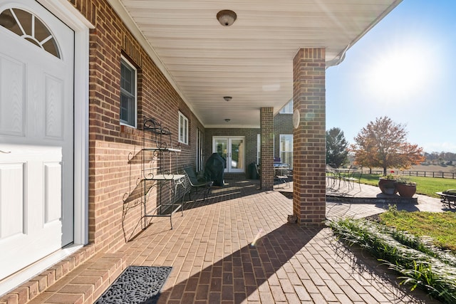 view of patio featuring covered porch