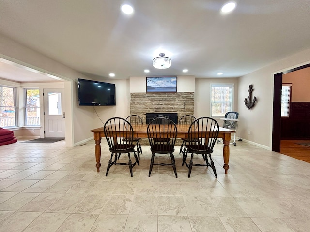 dining space with a fireplace