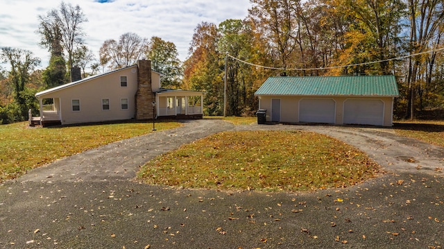 view of side of property with a yard