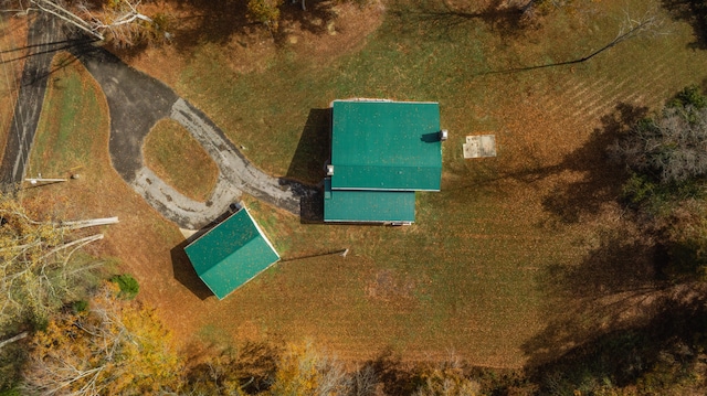 birds eye view of property with a rural view