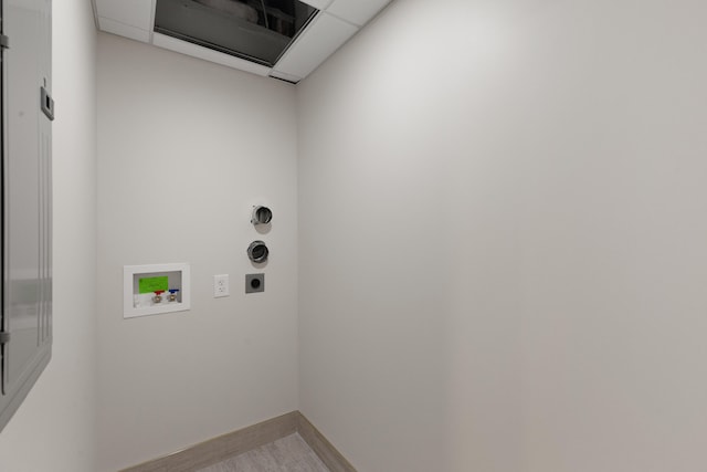 106 W Vine St Unit 407, Lexington, KY 40507 - laundry room featuring hookup for an electric dryer, hookup for a washing machine, wood finished floors, and baseboards