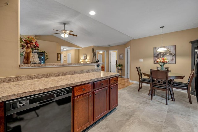 kitchen featuring ceiling fan, decorative light fixtures, vaulted ceiling, and black dishwasher