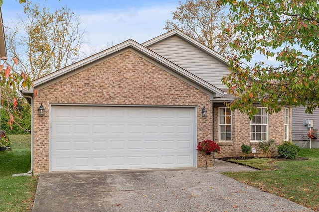 view of front of property featuring a garage and a front lawn