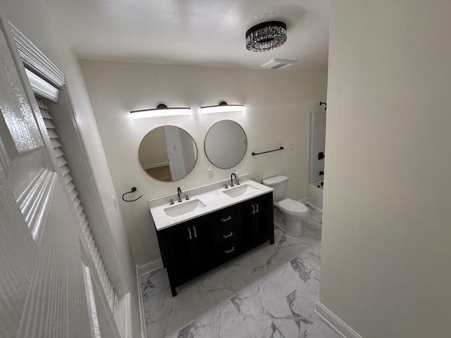 full bathroom featuring vanity, toilet, and tub / shower combination