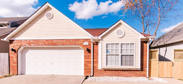 ranch-style home featuring a garage