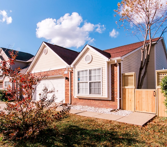 single story home featuring a garage