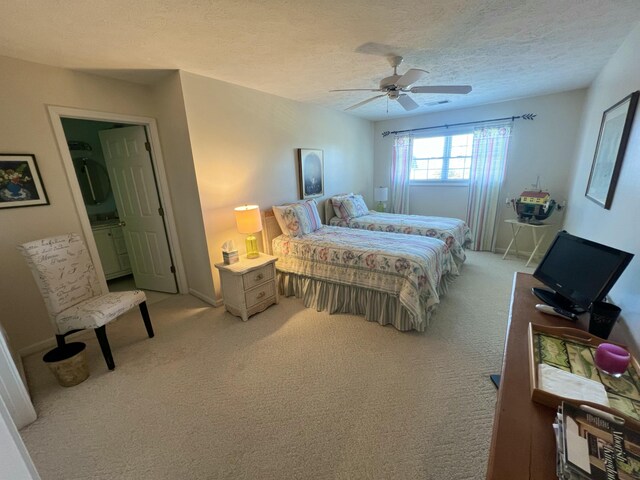 bedroom with light carpet, a textured ceiling, and ceiling fan