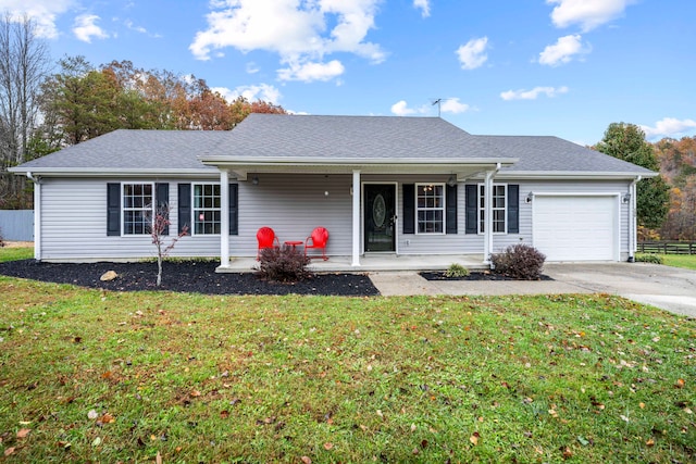 single story home featuring a front yard and a garage