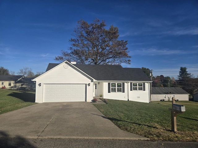 view of front facade featuring a front lawn and a garage