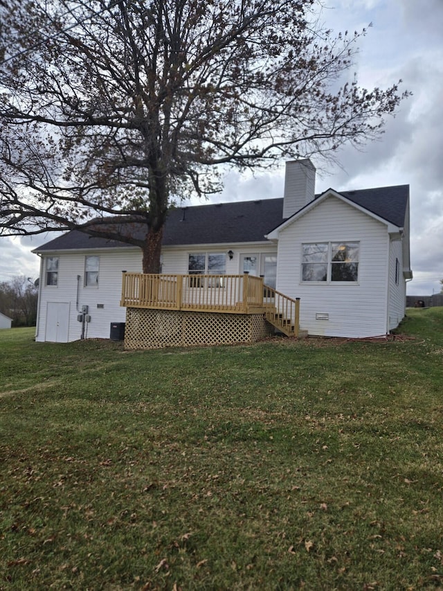 87 Cardinal Cir, Lancaster, KY 40444 - back of property with a wooden deck, a chimney, and a yard