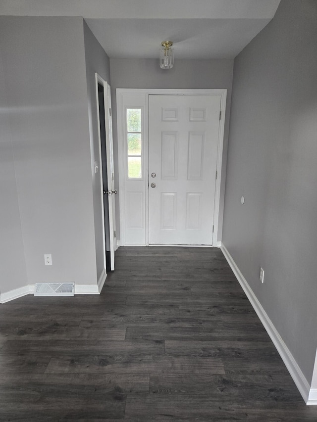 entrance foyer with dark hardwood / wood-style flooring