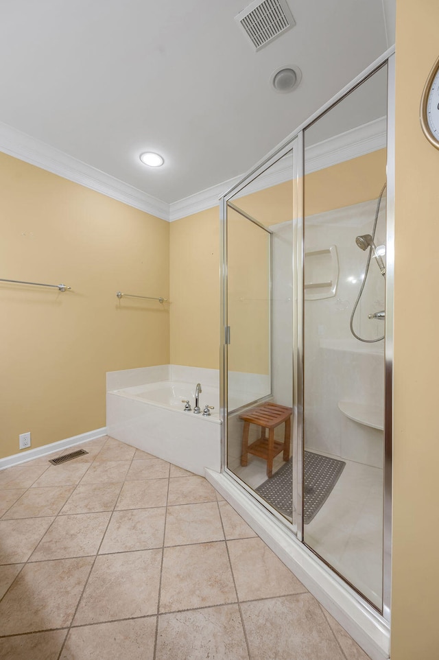 bathroom featuring tile patterned flooring, shower with separate bathtub, and crown molding