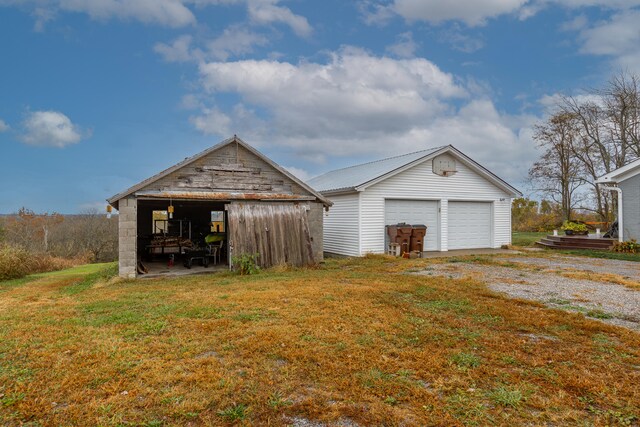 garage with a yard