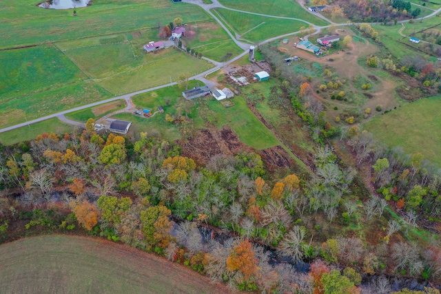 birds eye view of property featuring a rural view