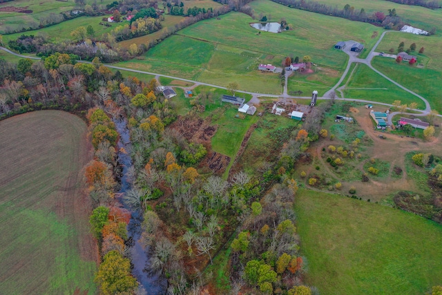 birds eye view of property featuring a rural view