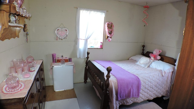 bedroom with concrete flooring