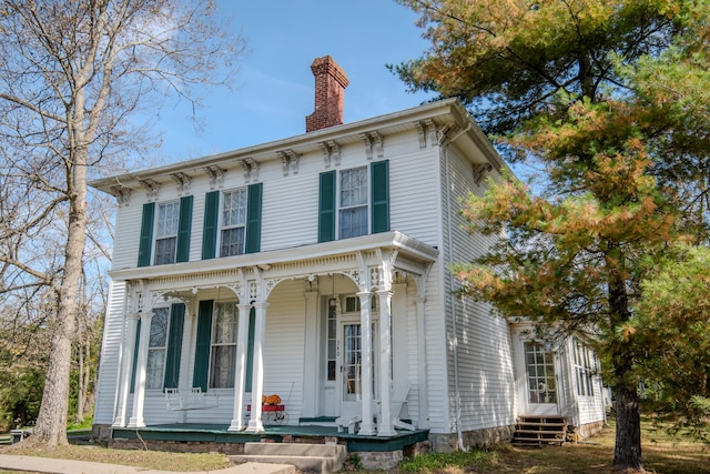 italianate home with covered porch