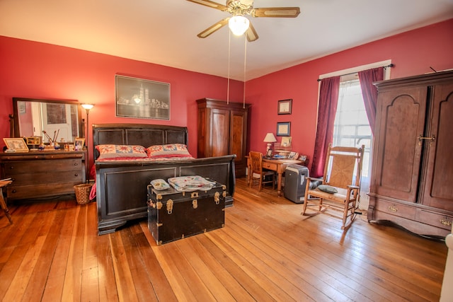 bedroom featuring light hardwood / wood-style flooring and ceiling fan