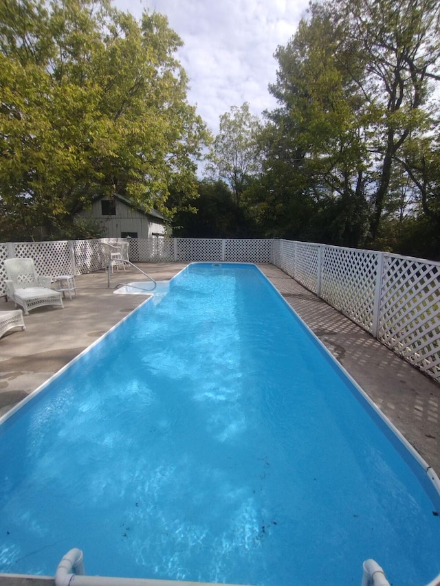 view of pool featuring a patio area