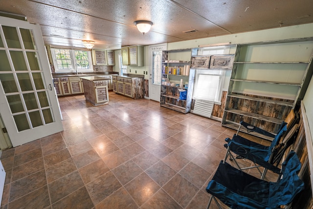 kitchen featuring a textured ceiling