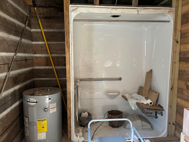 utility room with electric water heater