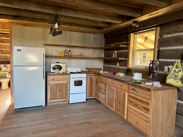 kitchen featuring beam ceiling, white appliances, decorative light fixtures, and light hardwood / wood-style floors