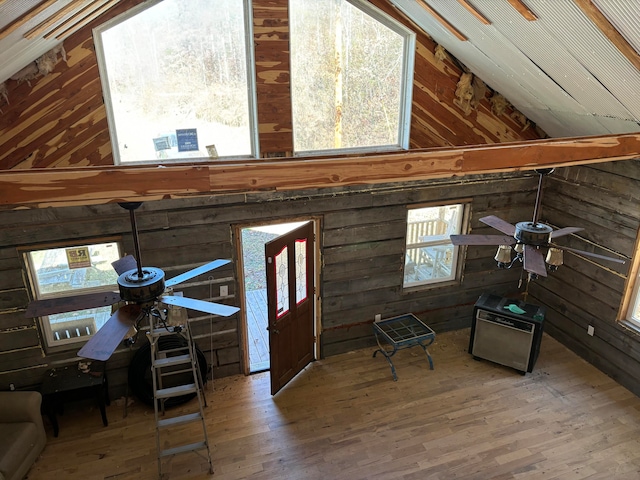 unfinished attic featuring plenty of natural light