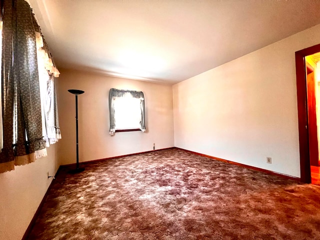 view of carpeted spare room