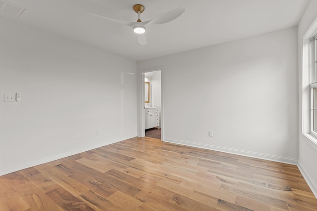 unfurnished room featuring light hardwood / wood-style flooring and ceiling fan