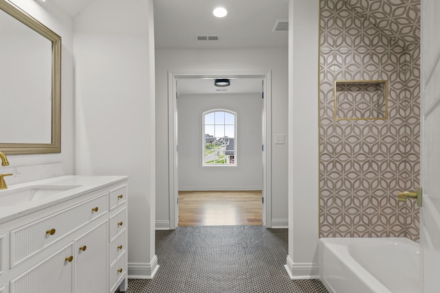 bathroom with vanity and tile patterned flooring