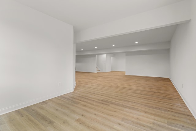 spare room featuring light hardwood / wood-style flooring