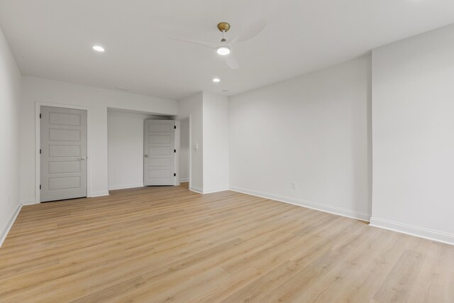 interior space featuring light wood-type flooring and ceiling fan