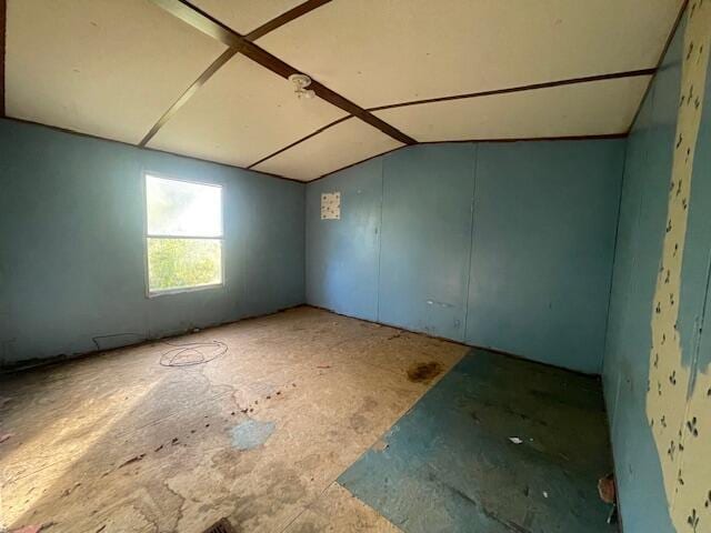 bonus room featuring lofted ceiling