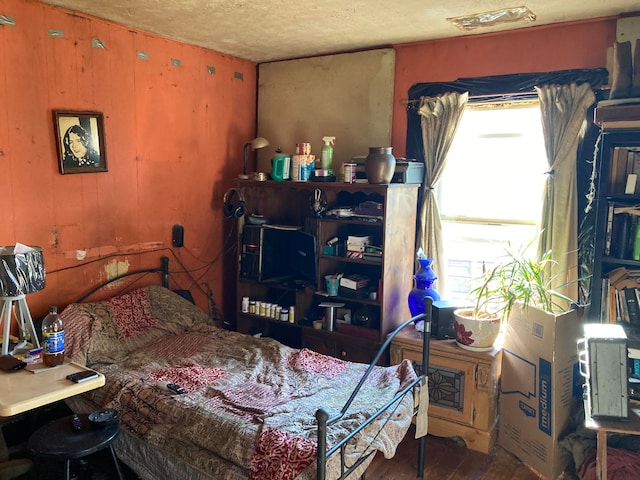 bedroom featuring wood-type flooring