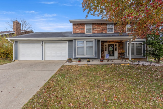 view of property featuring a garage, a porch, and a front yard