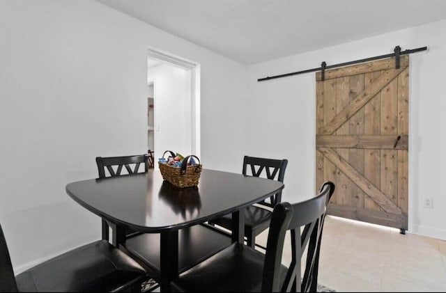 dining space with a barn door