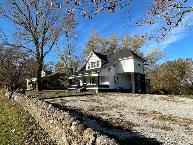 view of home's exterior featuring a porch