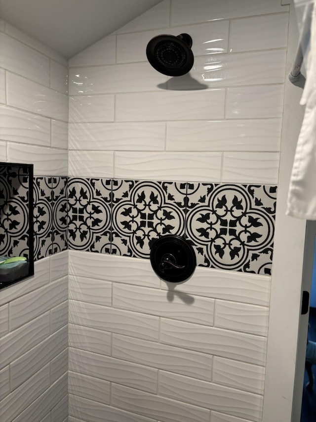 room details with a tile shower