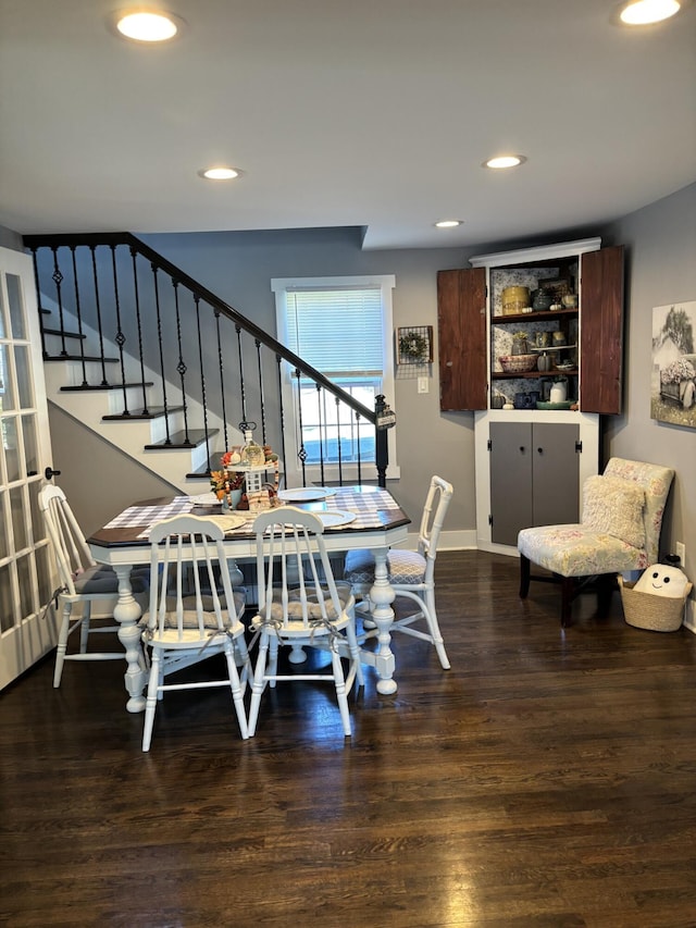 dining room featuring dark hardwood / wood-style flooring