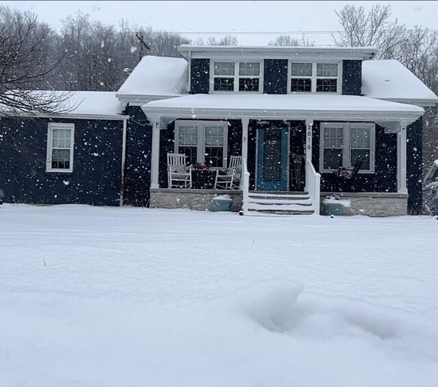 view of side of home with a yard