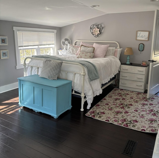 bedroom featuring dark hardwood / wood-style floors